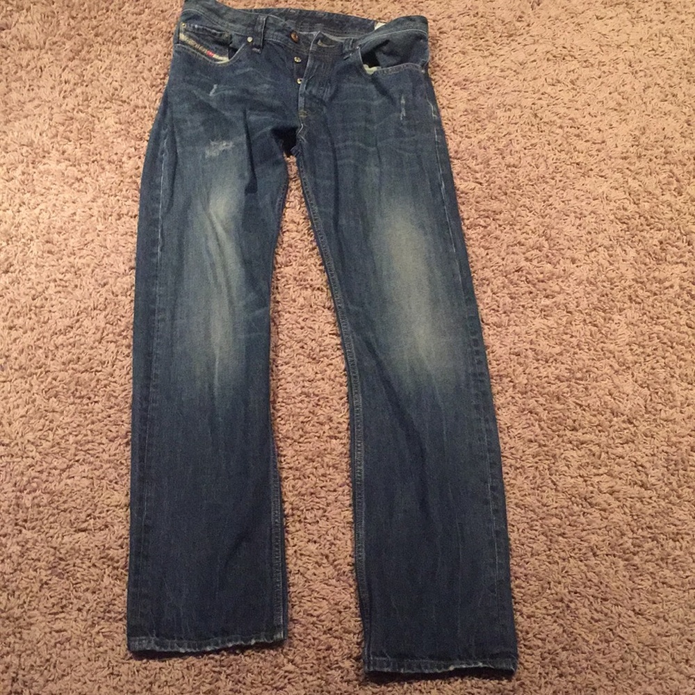 Slightly distressed blue washed denim by Diesel